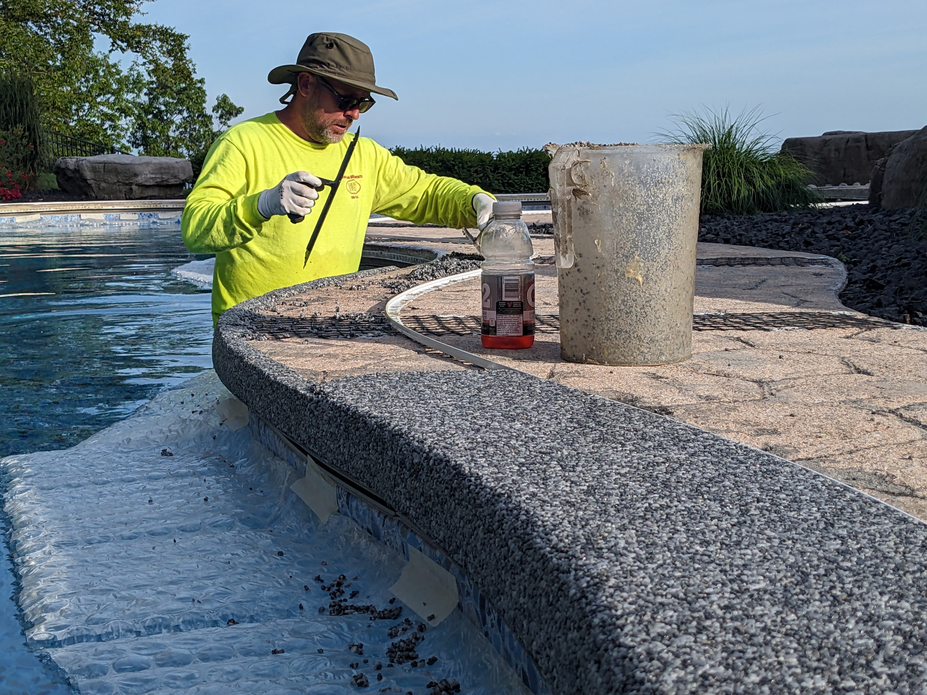 Pool deck resin-bound surround