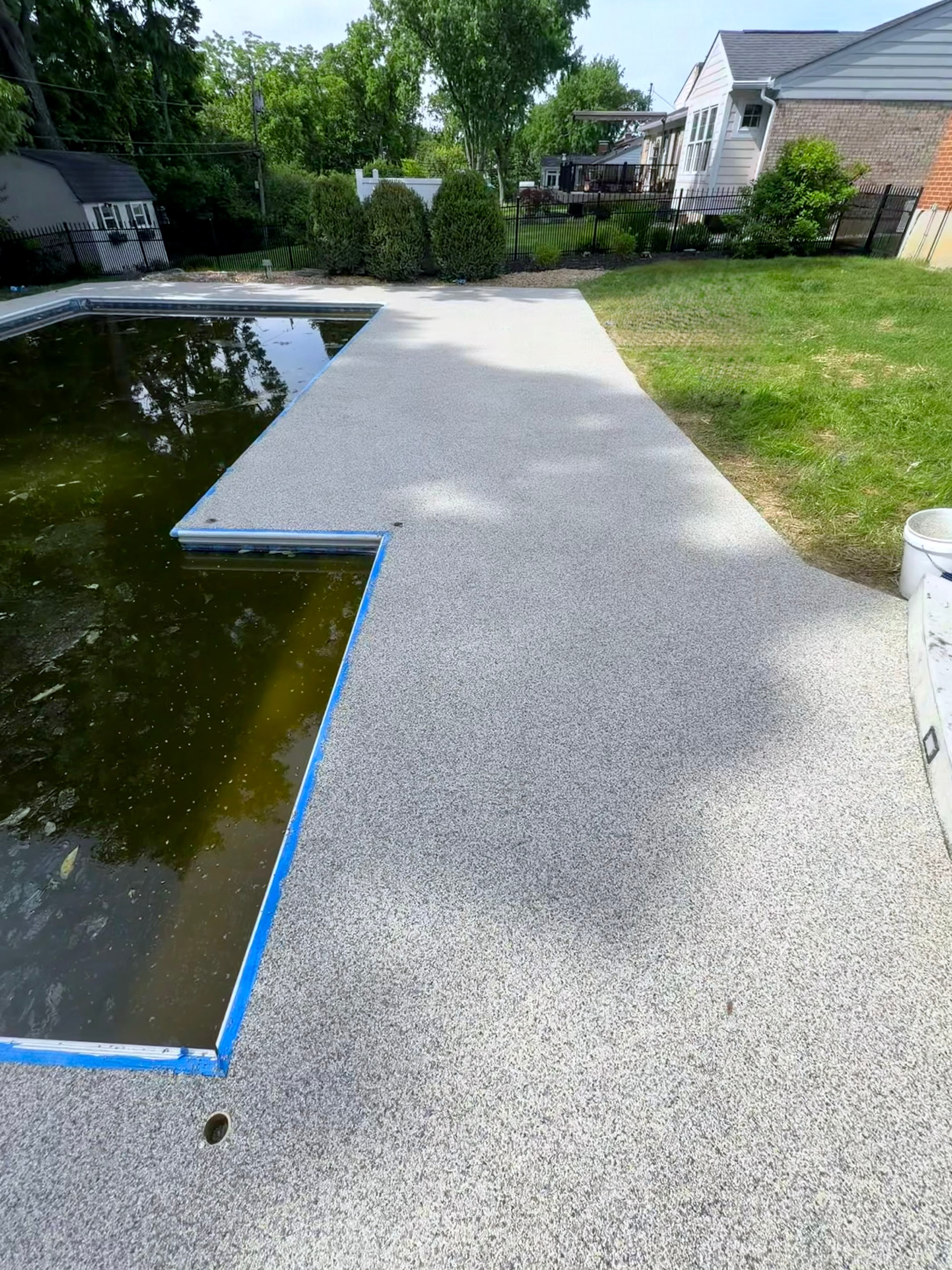 Pool deck resurfacing after
